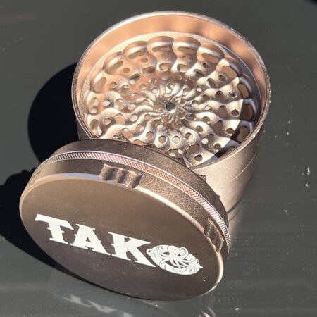 Tako Logo Millstone Herb Grinder