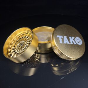 Tako Logo XL Millstone Herb Grinder - Gold